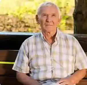 An authentic lifestyle photo of a healthy senior man from Boston, Massachusetts, expressing satisfaction with his nighttime sleep quality and stable vital signs.